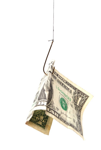 dollar-bill-held-by-fishing-hook-picture-id173621534