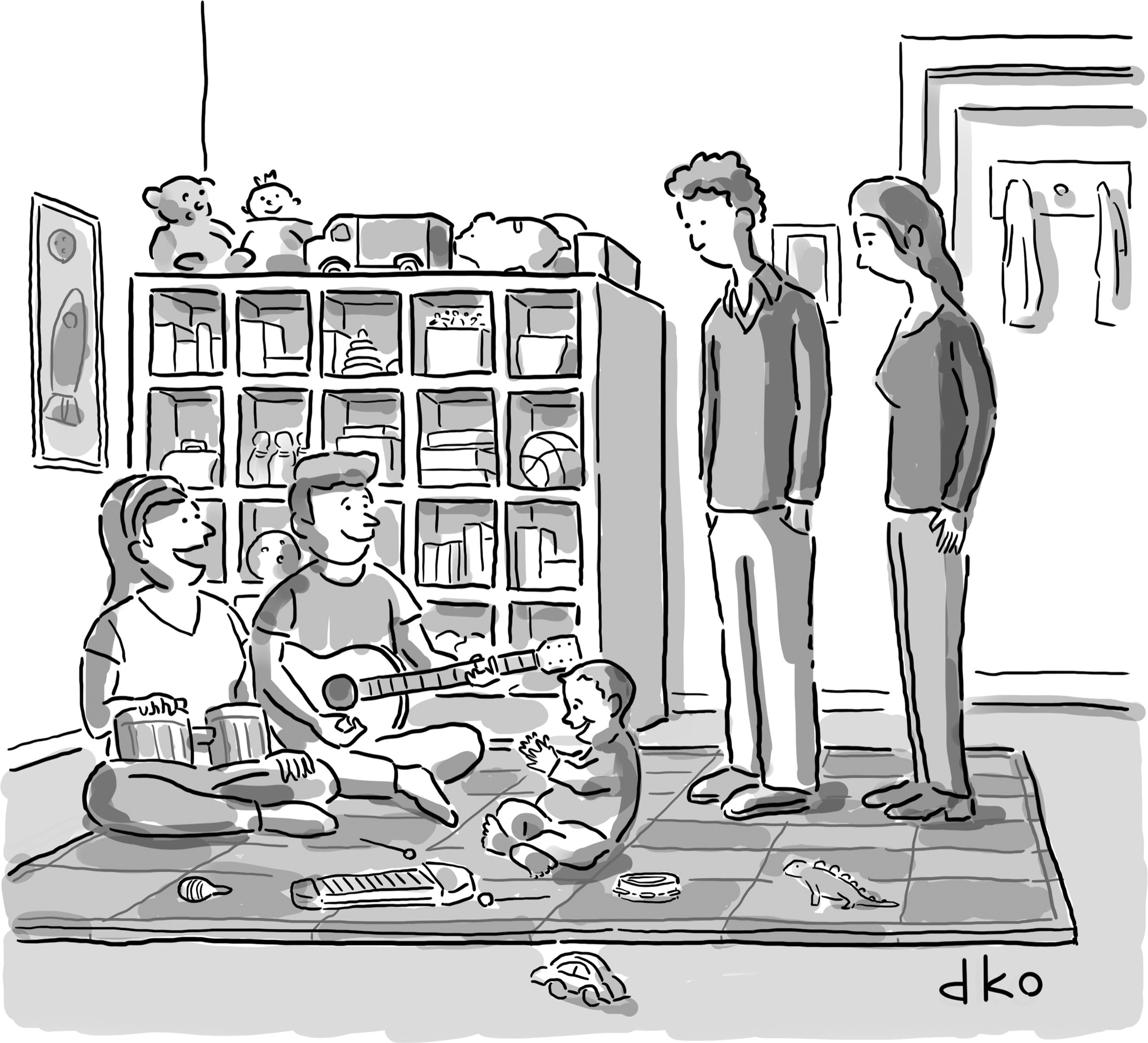 Parents sitting in playroom with child, playing instruments, two persons standing next to them.