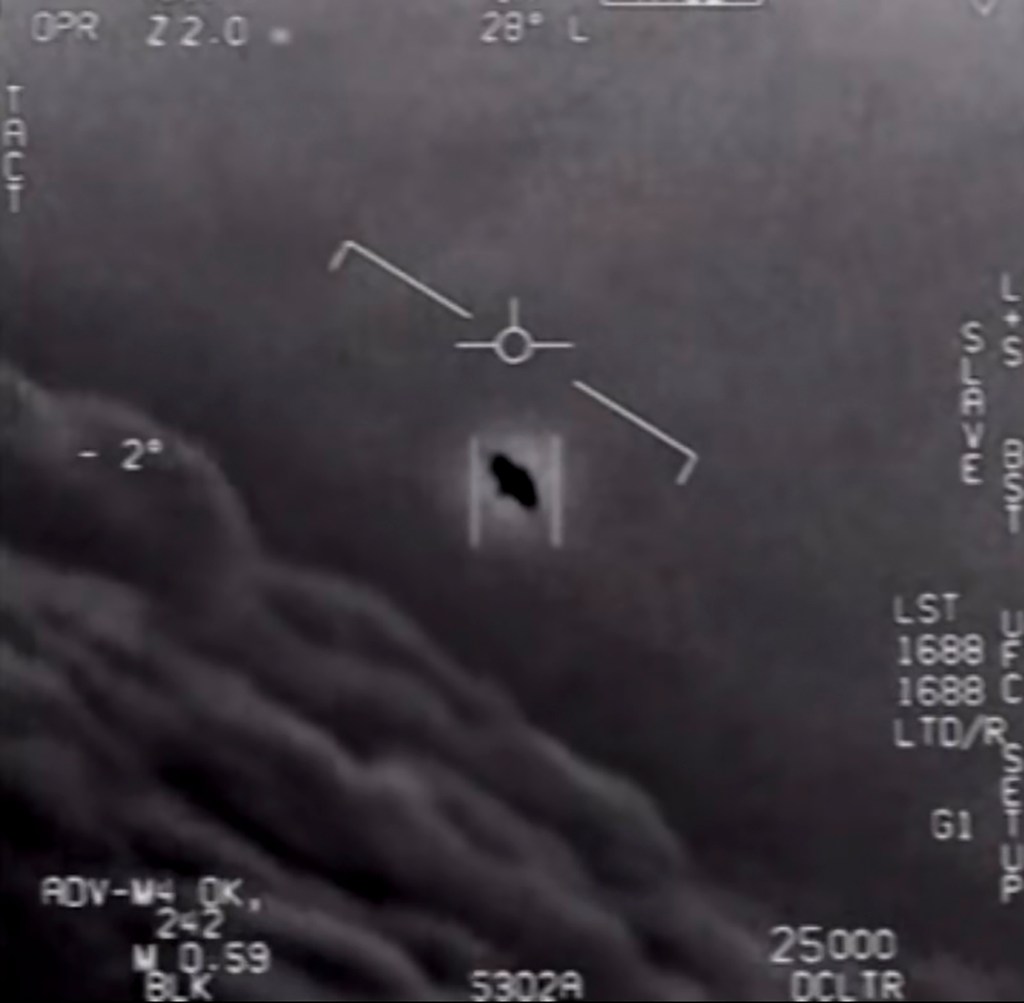 This video grab image obtained April 28, 2020 courtesy of the US Department of Defense shows part of an unclassified video taken by Navy pilots that have circulated for years showing interactions with unidentified aerial phenomena.