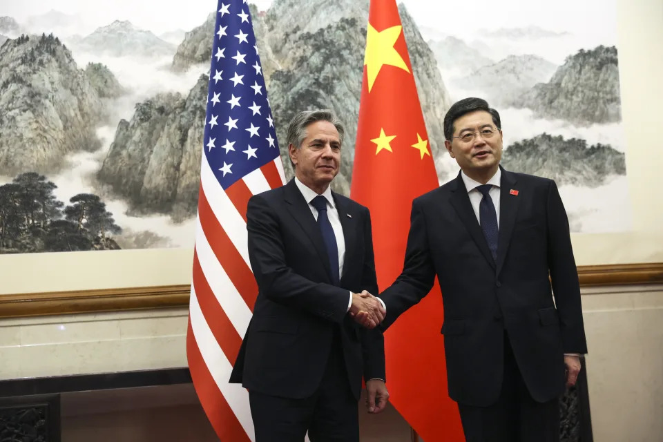 U.S. Secretary of State Antony Blinken, left, shakes hands with Chinese Foreign Minister Qin Gang, right, at the Diaoyutai State Guesthouse in Beijing, China, Sunday, June 18, 2023. (Leah Millis/Pool Photo via AP)