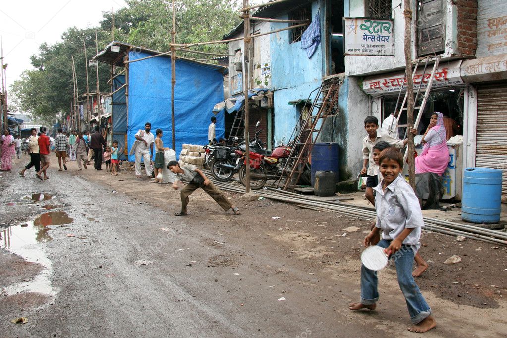 depositphotos_11817833-stock-photo-street-life-slums-in-bombaby.jpg