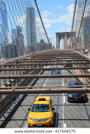 stock-photo-new-york-july-traffic-at-the-brooklyn-bridge-457668370.jpg
