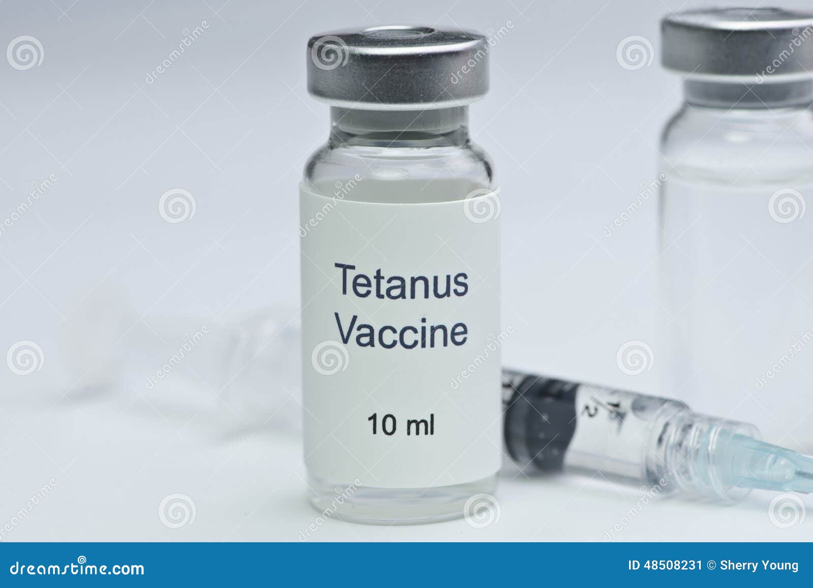 tetanus-vaccine-glass-vial-syringe-48508231.jpg