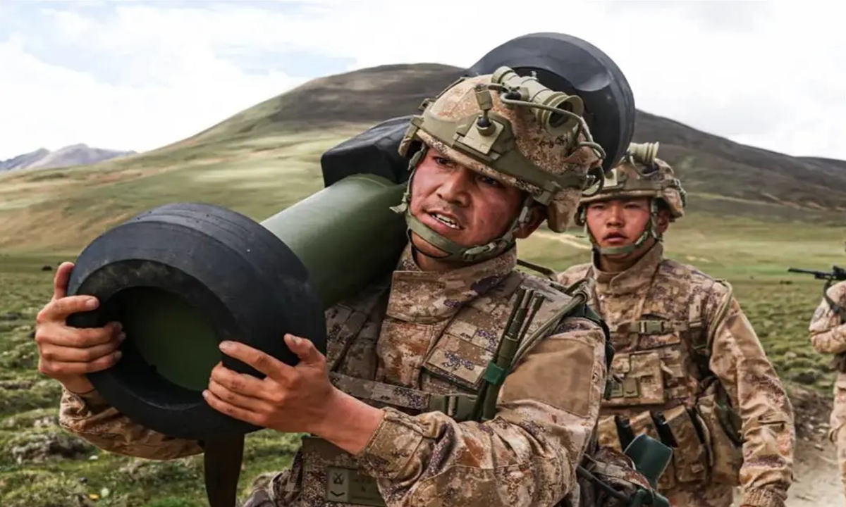 A soldier attached to a brigade affiliated with the #PLA #Tibet Military Command marches in training exercises, carrying a HJ-12 man-portable anti-tank missile, deep in Southwest China's plateau region in July 2021. Photo: Screenshot from the WeChat account of the PLA Tibet Military Command