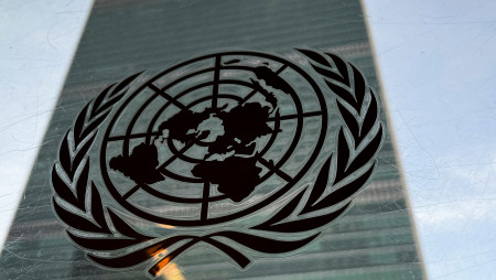 FILE PHOTO: The United Nations headquarters building is pictured with a UN logo in the Manhattan borough of New York City, New York, U.S., March 1, 2022. REUTERS/Carlo Allegri